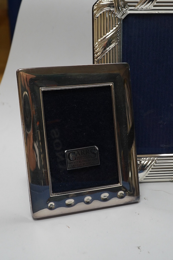 A modern boxed Carr's of Sheffield, silver mounted double photograph frame, width 18.3cm, together with two other silver mounted photograph frames and an Italian silver plated frame. Condition - good